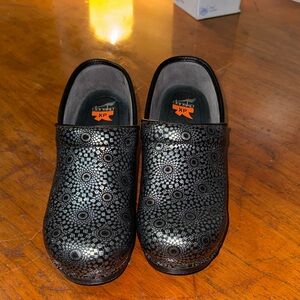 Dansko Black Geometric Clogs